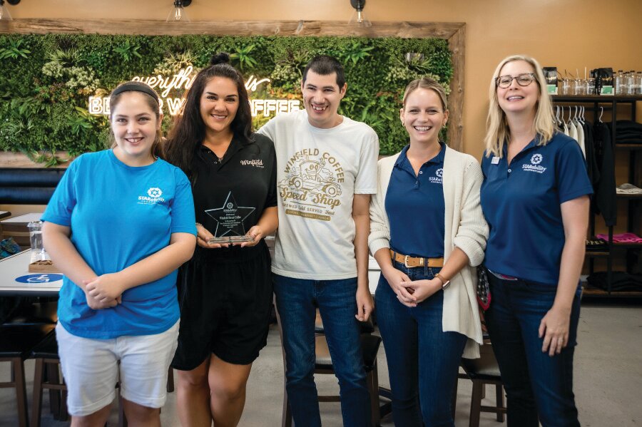 Alexis Kypriotes, STARability participant; Jeanette Donatti, Winfield Street Coffee co-owner; Dago Romero, STARability participant; Halley Kretschmer, STARability vocational services manager; and Alison Schwartz, STARability job coach.